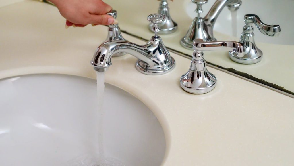 tightening faucet handle plumbing maintenance