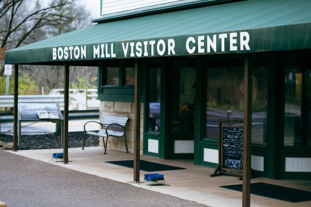 visitor center hours sign entrance