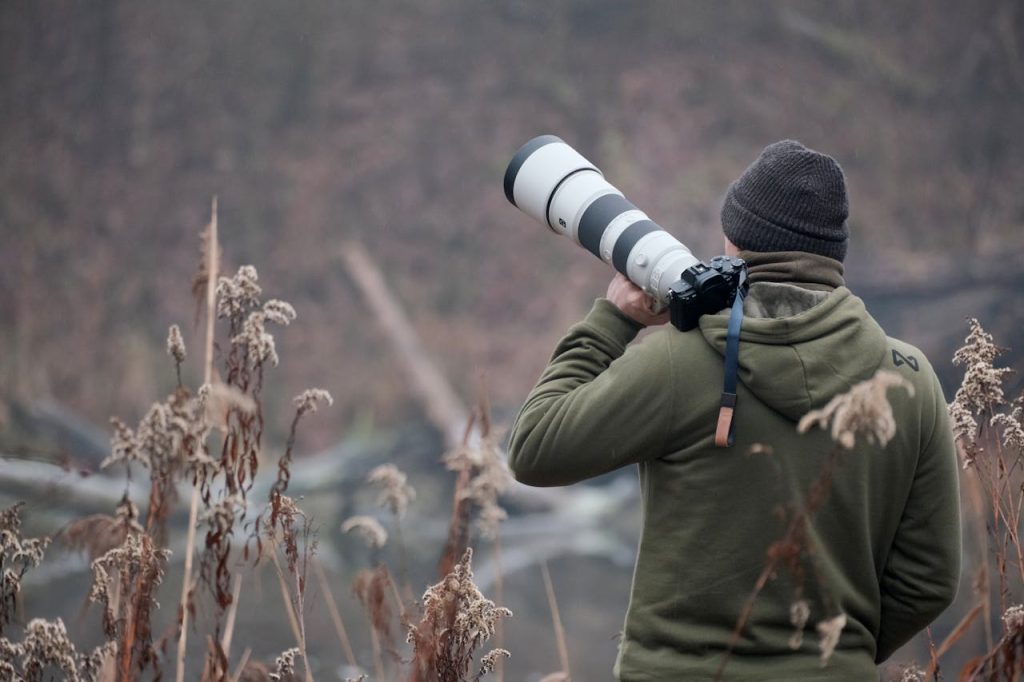 hiking photographer telephoto